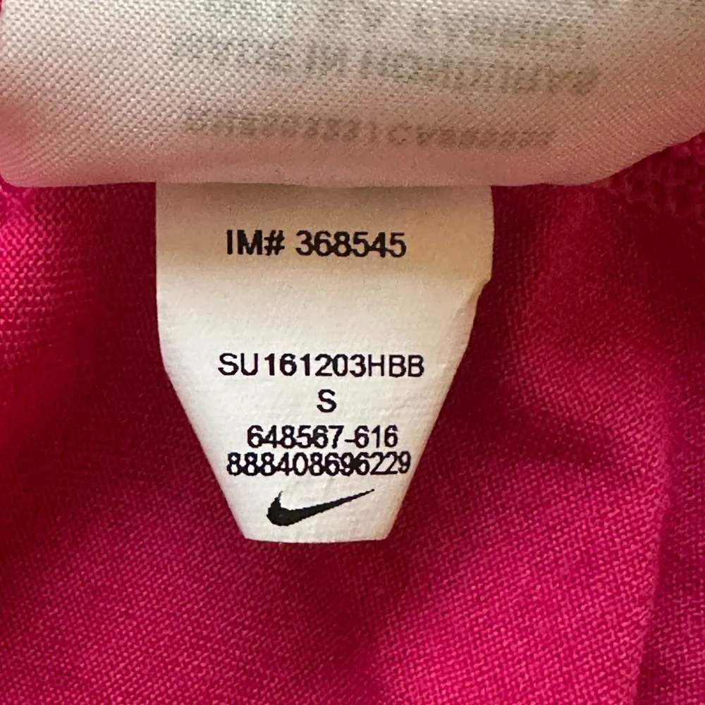 Nike Women’s Dri-FIT Racerback Tank Top in Bright Pink
